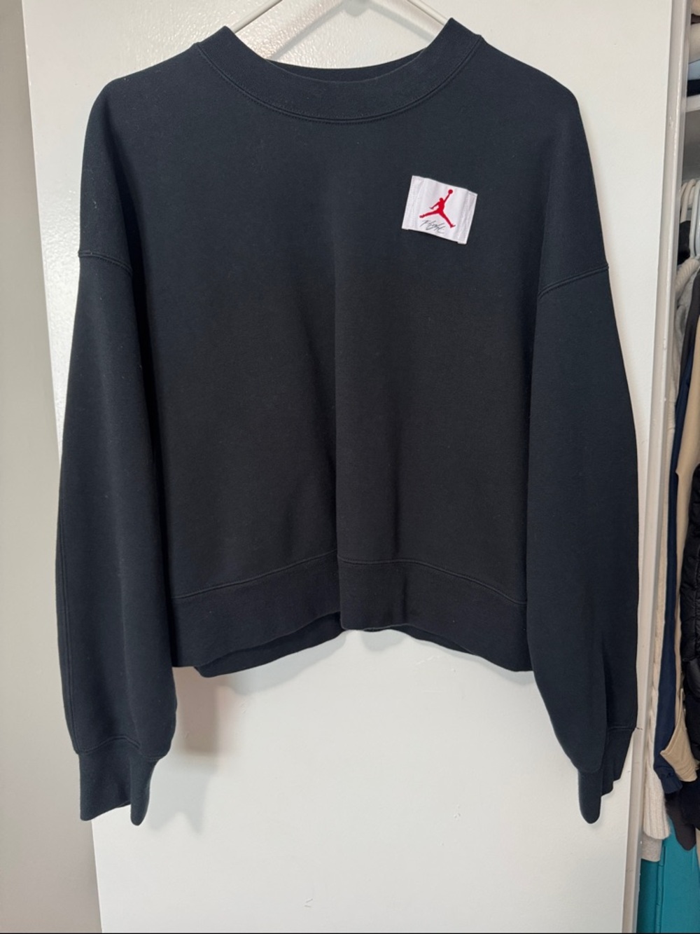 Jordan Black Crewneck Sweatshirt with Red Jumpman Patch